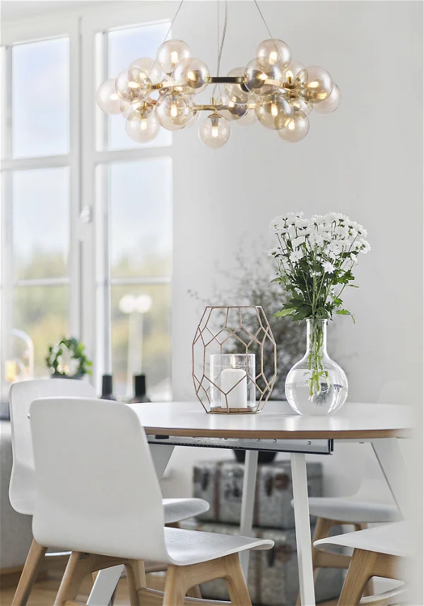 a picture shows how a pendant light embellishes a Christmas background